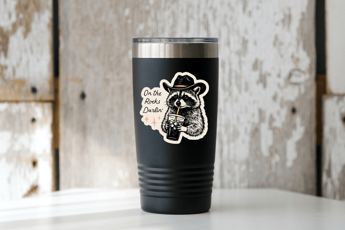 On the Rocks Darlin' Sticker - iced coffee, raccoon, cowboy