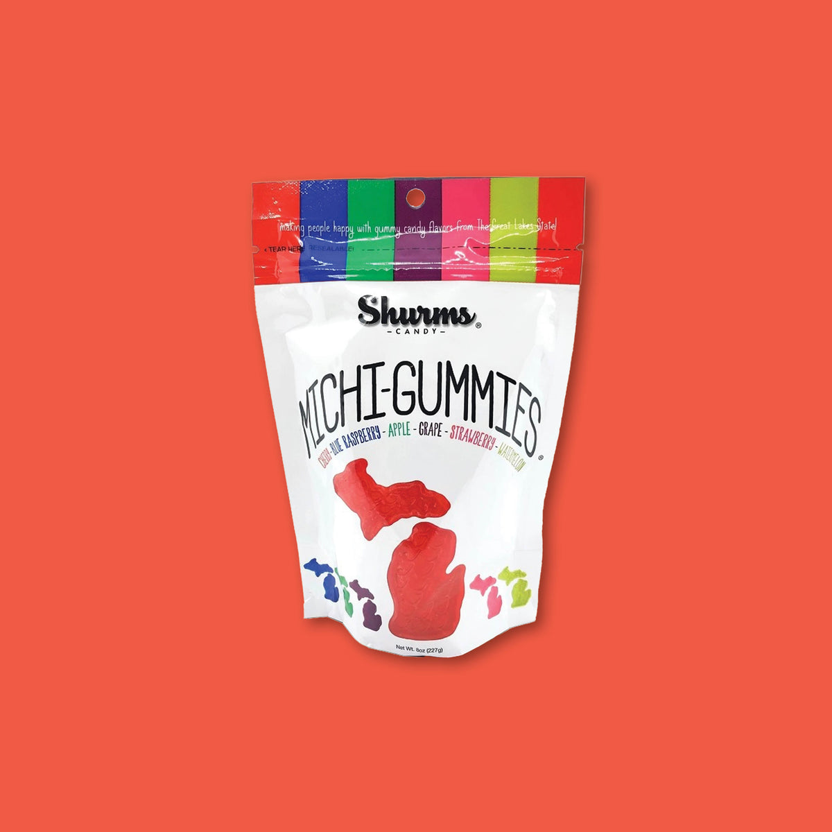 On a tomato red background sits an 8 oz. white and rainbow colored pouch of Michi-gummies from Shurms Candy.