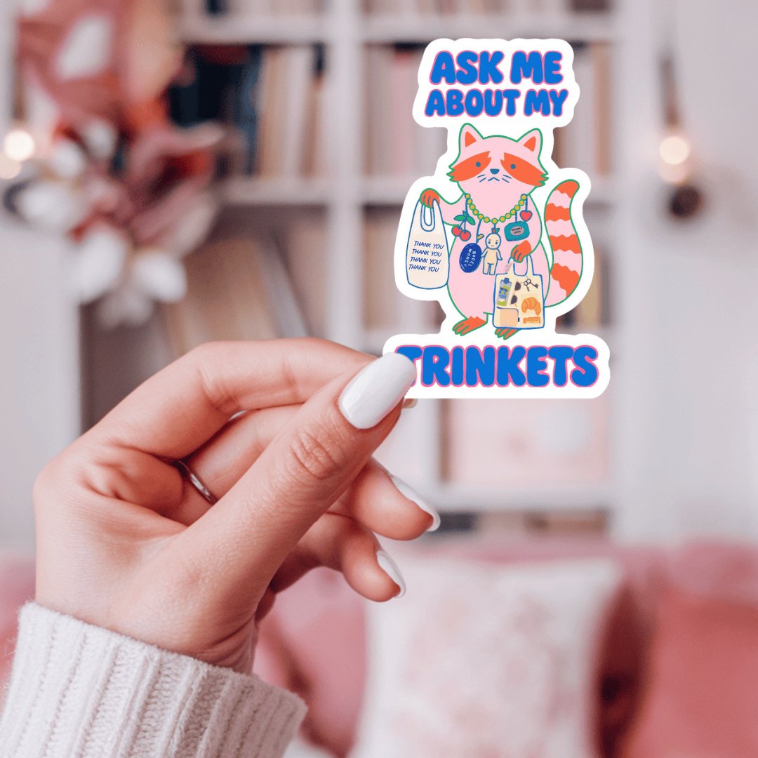 Ask Me About My Trinkets Sticker –Quirky Raccoon Collectible